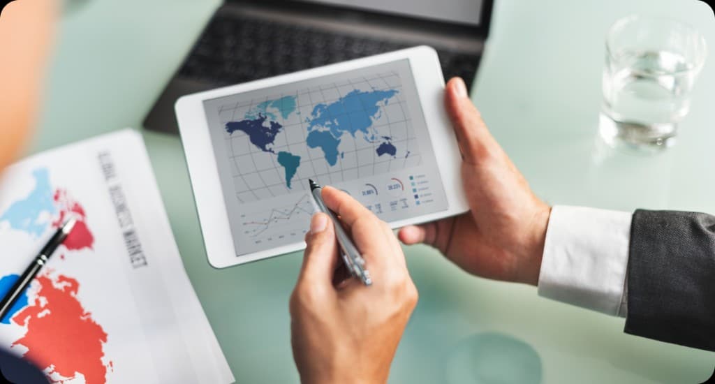 Professionals collaborating on global payroll services